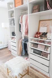 Perfect minimalist closet layout with a leading rack on one wall, a mirror on the opposite wall and shoe shelves on the third one. Cloffice Makeover Reveal Money Can Buy Lipstick Cloffice Tour Closet Office Walk In Cl Kleine Wohnung Schrank Schrankdekoration Ikea Pax Kleiderschrank