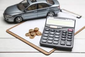 Download Car Model Calculator And Coins On White Table For Free In 2020 Cheap Car Insurance Car Loans Car Insurance