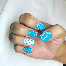We may earn commission from the links on this page. Cute Blue White Polka Dots Nails Blurmark