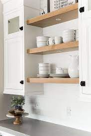 Floating shelves and floating wall shelves many sizes and designs invisible wall mounting high.suspended shelves in the kitchen: White Oak Floating Shelves And Shiplap Backsplash Floating Shelves Kitchen Farmhouse Kitchen Backsplash Modern Farmhouse Kitchens