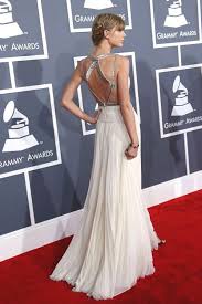 Taylor swift also made history at sunday's ceremony, by becoming the first female artist ever to win album of the year three times. Taylor Swift Grammy 2013 Min Ecemella