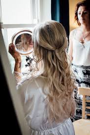 Half up half down wedding hairstyles like this one are you can show off beautiful curls and wear your voluminous wedding veil with ease and comfort. 17 Gorgeous Half Up Half Down Wedding Hairstyles