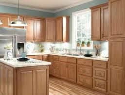 The reason why it works is the contrast. Oak Kitchen Cabinet Decorating Ideas