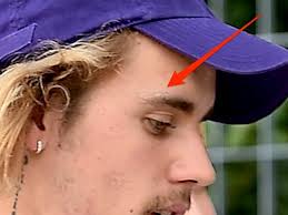 Justin bieber owl temporary tattoo sheet of temporary tattoos. Justin Bieber Has A New Face Tattoo