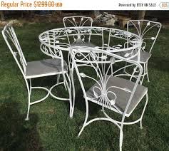 Vintage Wrought Iron White Garden Patio Table 4 Chairs Ivy Etsy Iron Patio Furniture Wrought Iron Chairs Wrought Iron Patio Furniture
