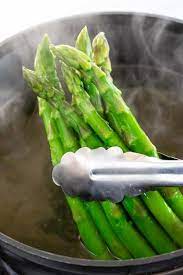 Steamed asparagus is served with roasted pine nuts, which makes for a good. How To Cook Asparagus 6 Easy Methods Jessica Gavin