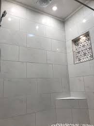 Carrara White Rectangle Tile Merona Tile From Home Depot In A Black And White Flower Patte Home Depot Bathroom Home Depot Bathroom Vanity Stone Floor Bathroom