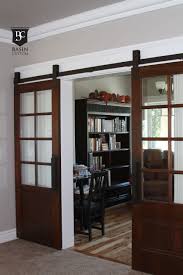 Gorgeous Double Half Glass Sliding Interior Barn Doors With White Door Trim As Well As Classic Interior Ca Interior Barn Door Hardware Home Interior Barn Doors