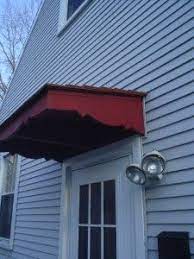 Project Spotlight How To Use Custom Wooden Awnings For Style Protection From Sun Rain Snow House Awnings Door Awnings Patio Canopy