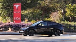 Tesla Model Y In Black Paparazzied Outside The Tesla Hq In Palo Alto Ca Tesla Tesla Model Tesla Car