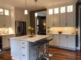 Lowe S Project Specialist Eta Eckhardt Combines Stainless Elements Wood Floors White Shaker Cabine Kitchen Renovation Design Kitchen Renovation Real Kitchen