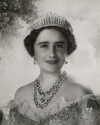 The Queen Mother, Elizabeth Bowes-Lyon, posing for the lens of Cecil  Beaton, wearing a dress covered in sparkling sequins designed by Norman  Hartnell. It was one of her favourites and was seen