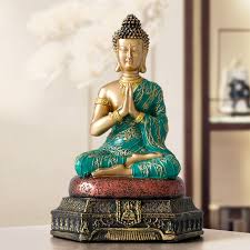 Just as in yoga, the various poses you find buddha in is called asanas, and the placement of their hands in to various positions is called mudras. New Chinese Tathagata Buddha Statue Decoration Living Room Entrance Cabinet Keeping Peace Zen Home Decoration Crafts Decoration