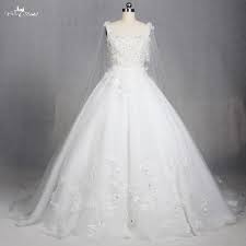 Auf der suche nach einem perfekten brautkleid für eine hochzeit mit wald, strand, rasen oder kaufen sie von milanoo für das schicke und gute qualit?t 2021 boho & bohemian hochzeitskleid in. Tw0189 Boot Ausschnitt Illusion Mantel Applique Mit Perlen Strass Prinzessin Stil Hochzeitskleid Wedding Dress With Rhinestone Wedding Dress Appliquesrhinestone Appliques Wedding Dresses Aliexpress