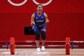 Boxer nesthy petecio of the philippines holds her women's featherweight division silver medal while. Weightlifting Diaz Wins First Ever Olympic Gold For Philippines Reuters