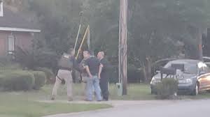 Travis mcmichael was found guilty of murdering ahmaud arbery on wednesday. Father Son Arrested In Shooting Death Of Unarmed Black Man Firstcoastnews Com