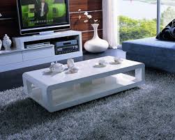 It's obviously a bit longer than a round coffee table, so it gives you as much surface area as possible while still offering a softer, more organic shape. Contemporary White Coffee Table Contemporary Coffee Table Coffee Table Coffee Table Design Modern
