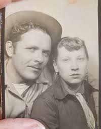 Found A picture of my Aunt when she lived in Rhodell don't remember who the  guy is.