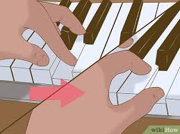 Position yourself at the center of the piano. How To Learn To Play The Organ 12 Steps With Pictures Wikihow