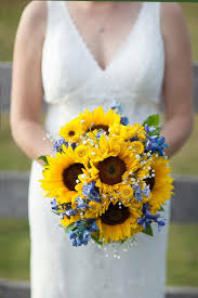 Bridal Bouquet Of Sunflowers Button Mum Blue Delphinium And Touches Of Baby S Breath Blue Delphinium Delphinium Bouquet Sunflower Wedding Bouquet