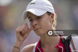 Alize Cornet (FRA) leaves the court after her match against Victoria  Azarenka (BLR)