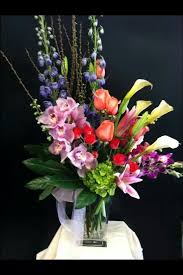 Flowers and more, located in fresno, california, is at west bullard avenue 3042. Spring Floral Arrangement By Robyn Flowers And More Fresno Ca Beautiful Flowers Graduation Flowers Hanging Flower Baskets