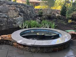 Maybe you would like to learn more about one of these? Round Koi Pond Patio Plantings And Retaining Wall K R Landscape