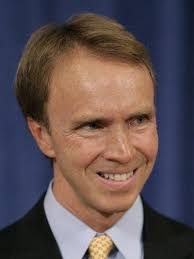 Hollenbach wins in crowded district court field.