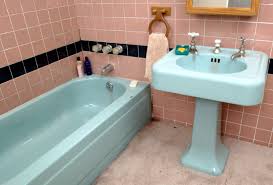 Check out the wooden tray that spans the tub; Reviving Your Old Bathroom Bathroomdesigner