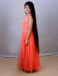 Long hair gives me a headache, neck ache, oily face, and it knots so easy around my neck. Longest Hair Among Children Ibr