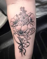 This tattoo represents a dual personality; Flower Tattoos For Guys Blooming Body Art For Passionates Saved Tattoo