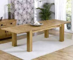 Our farmhouse reclaimed wood extendable dining table is made from 100+ year old reclaimed planks salvaged from a midwestern barn. Extending Tables Dining Room Furniture First Furniture