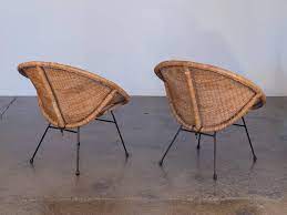 Ornately crafted in polished teak wood, and a rattan cane seat and backing, this accent chair would make a beautiful addition to your home. Pair Of Mid Century Rattan Scoop Chairs At 1stdibs