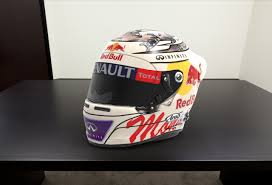 This feature is currently not available because you need to provide consent to functional cookies. The White Helmet With The Flag Is Now His Distinctive Mark Helmet Designer On Sebastian Vettel Essentiallysports