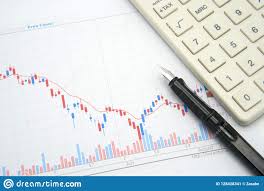 Fountain Pen Placed On The Stock Chart Is The Background