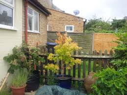 Concrete gravel boards for closeboard fencing. How To Use Featherboard To Hide Clad Old Concrete Fencing Jacksons Fencing