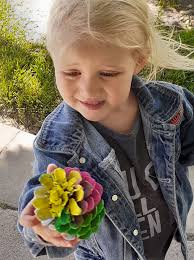 Scarlett is enjoying her pinecone.