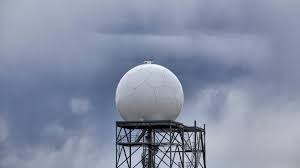 Weather radar dome in wooded area scanning for severe storms