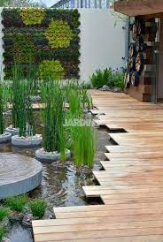 niche au cœur d une grande ville ce jardin realise sur une terrasse d immeuble repond a la necessite d une gestion e garten balinesischer garten stadtgarten