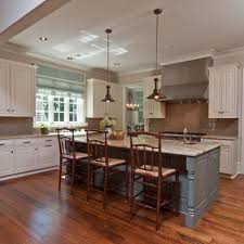 Each base features four metal legs that taper to thin points and a crossbar where you can rest your feet. U Shaped Kitchen With Island Design Dining Room Wainscoting Kitchen Island Design Wainscoting Kitchen