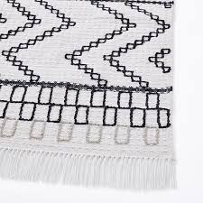 A black and white outdoor rug, in a beautiful botanical pattern or in a sophisticated border rug for example, can instantly transform your backyard pool into a fashionable retreat. Ravine Indoor Outdoor Rug