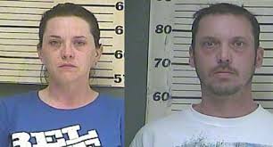 Greenup couple steals purse out of shopping cart