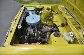 Image result for Herald Yellow 1974 Subaru