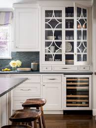 Clean and crisp white kitchen. This Hot Kitchen Backsplash Trend Is Cooling Off