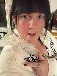 I was sitting at my kitchen tablw and looked out to see a heart shape in  the branches for the first time evwr !! Can you see the heart shape in the