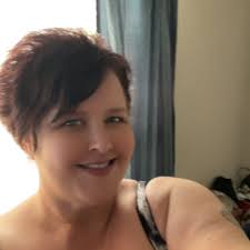 Homeless woman in front of E.C. Glass memorial