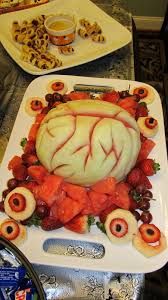 Making Halloween Party Trays Out Of Food My Personal Favorite The Brain And Eye Fruit Tray Halloween Fruit Halloween Food For Party Halloween Fruit Tray