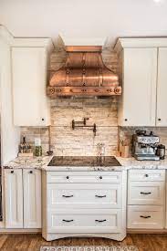 We stock several models of kitchen range hoods based off of the most common kitchen cabinet and ceiling dimensions, however, most of our hammered copper range hoods are made. Camellia Range Hood Art Of Rain Handcrafted In Washington Usa Tuscan Kitchen Farmhouse Kitchen Decor Modern Farmhouse Kitchens