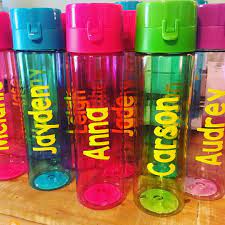 Student End Of Year Gift Idea Water Bottles From Dollar Tree Names Created With Vinyl On Cricut Machin Dollar Tree Gifts Water Bottle Crafts Diy Water Bottle