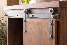 Swapping out your interior door for a sliding barn door saves space instantly. Barn Door Hardware For Cabinets Artisan Hardware